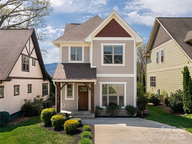 19 Tudor Way, Black Mountain, NC 28711 - view of front of house featuring roof with shingles, central air condition unit, and a porch