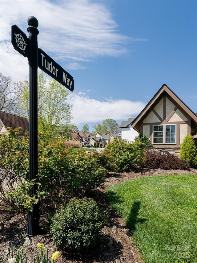 19 Tudor Way, Black Mountain, NC 28711 - view of side of property with stucco siding and a yard