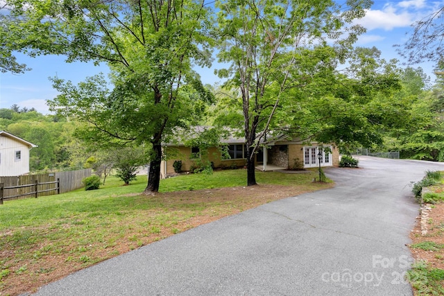 159 Amble Ln, Fletcher, NC 28732 - ranch-style home with fence, french doors, and a front yard