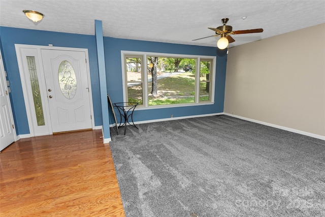 159 Amble Ln, Fletcher, NC 28732 - foyer entrance featuring a ceiling fan, baseboards, and a textured ceiling