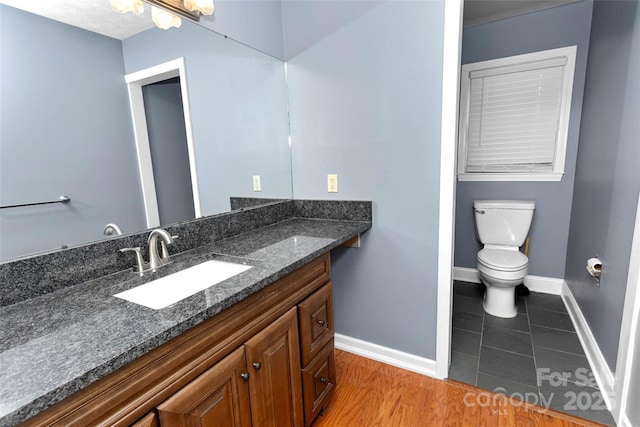 159 Amble Ln, Fletcher, NC 28732 - bathroom featuring baseboards, tile patterned floors, vanity, and toilet