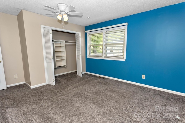 159 Amble Ln, Fletcher, NC 28732 - unfurnished bedroom with a ceiling fan, a closet, a textured ceiling, carpet, and baseboards