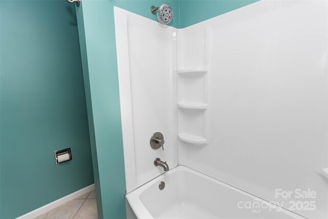 159 Amble Ln, Fletcher, NC 28732 - bathroom featuring tile patterned floors, baseboards, and shower / bath combination