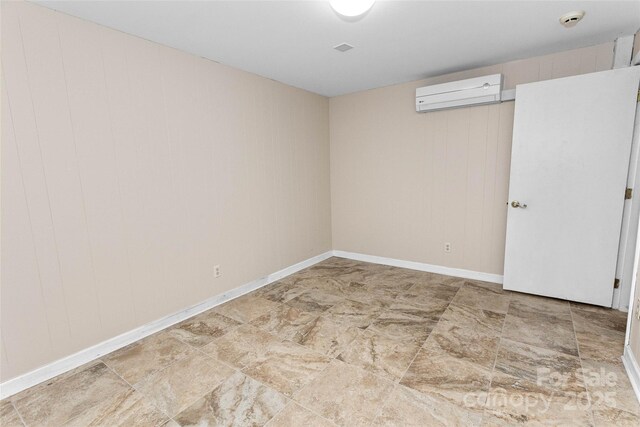 159 Amble Ln, Fletcher, NC 28732 - empty room featuring baseboards and a wall mounted AC