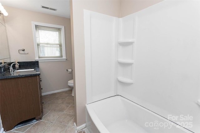 159 Amble Ln, Fletcher, NC 28732 - bathroom featuring toilet, vanity, visible vents, tile patterned flooring, and baseboards