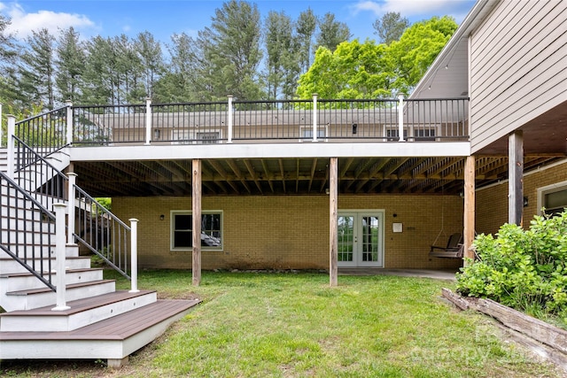 159 Amble Ln, Fletcher, NC 28732 - rear view of property featuring brick siding, a yard, french doors, and a deck