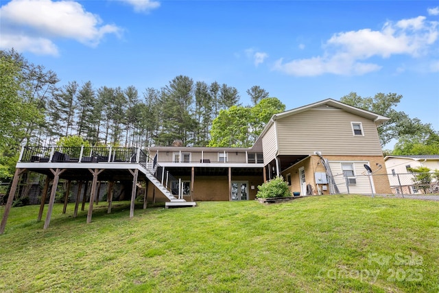 159 Amble Ln, Fletcher, NC 28732 - rear view of property with a lawn, stairs, fence, and a deck
