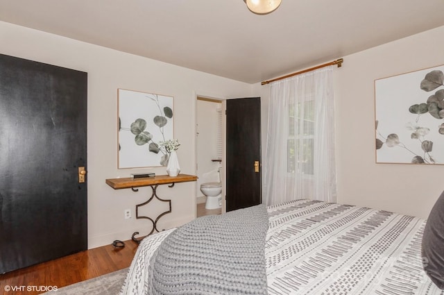 1501 Briarfield Dr, Charlotte, NC 28205 - bedroom featuring ensuite bath, wood finished floors, and baseboards