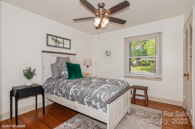 1501 Briarfield Dr, Charlotte, NC 28205 - bedroom with baseboards, a ceiling fan, and wood finished floors