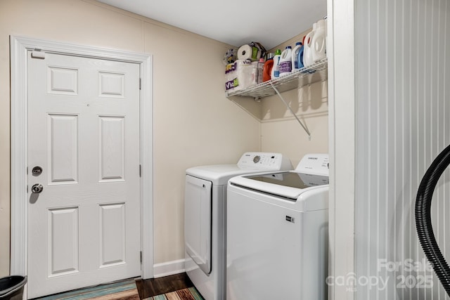 37 Bittersweet Dr, Hendersonville, NC 28792 - washroom with washing machine and dryer and dark wood finished floors