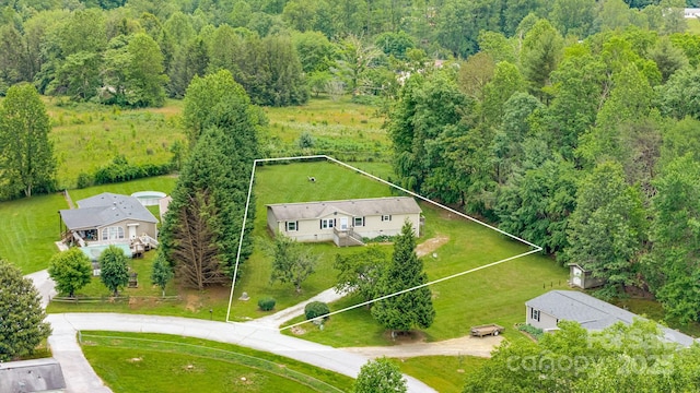 37 Bittersweet Dr, Hendersonville, NC 28792 - view from above of property with property parcel outlined and a heavily wooded area