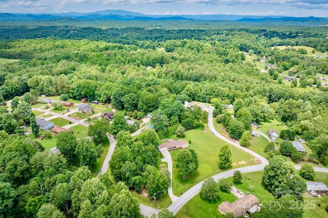 4897 Calico Rd, Lenoir, NC 28645 - bird's eye view of a heavily wooded area and mountains