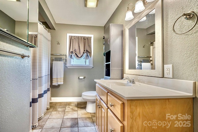 4897 Calico Rd, Lenoir, NC 28645 - full bath featuring vanity, a textured wall, a shower with shower curtain, and tile patterned flooring