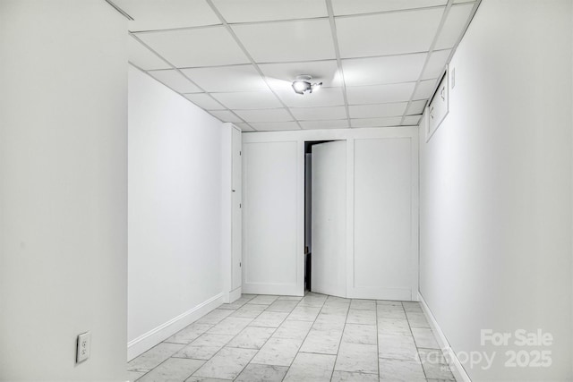 4897 Calico Rd, Lenoir, NC 28645 - spare room featuring light marble finish flooring and a drop ceiling