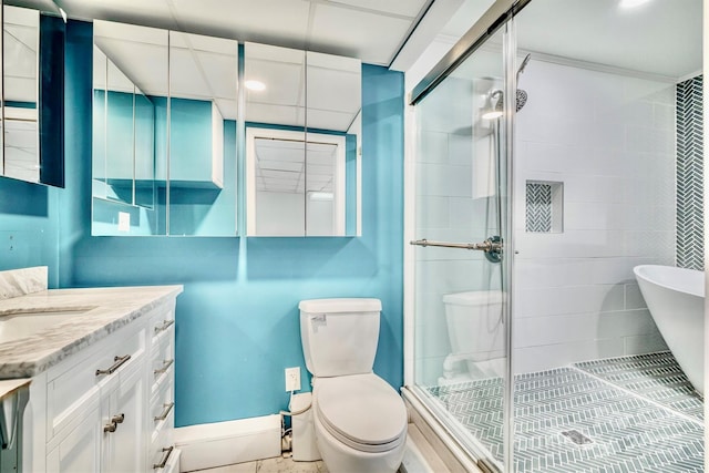 4897 Calico Rd, Lenoir, NC 28645 - bathroom with vanity, a stall shower, recessed lighting, and a soaking tub