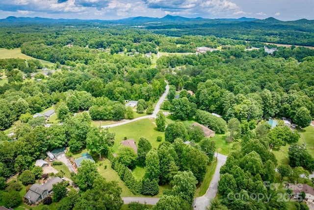 4897 Calico Rd, Lenoir, NC 28645 - aerial view of a heavily wooded area and a mountain backdrop