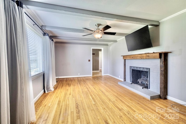 4897 Calico Rd, Lenoir, NC 28645 - unfurnished living room featuring a brick fireplace, beamed ceiling, hardwood / wood-style floors, and a ceiling fan