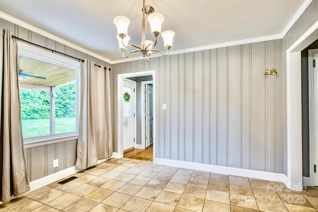 4897 Calico Rd, Lenoir, NC 28645 - unfurnished dining area featuring crown molding, a chandelier, and light tile patterned flooring