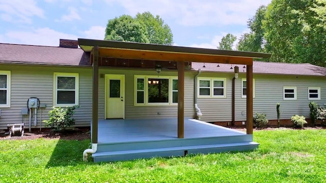 4897 Calico Road Lot 11A, Lot 11, Lot 11B, Lenoir, NC 28645 - back of property with a yard, a wooden deck, and a shingled roof
