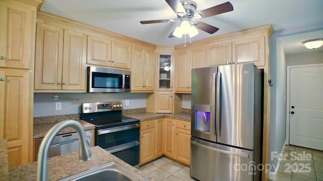 4897 Calico Road Lot 11A, Lot 11, Lot 11B, Lenoir, NC 28645 - kitchen with stainless steel appliances, light brown cabinetry, light tile patterned flooring, a ceiling fan, and glass insert cabinets