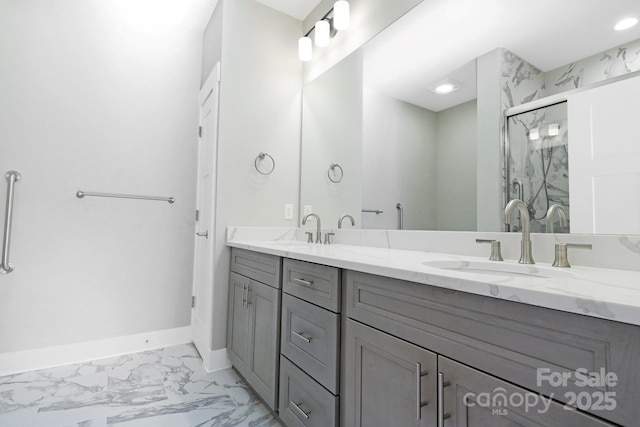 20 Brookstone Pl, Candler, NC 28715 - full bath with double vanity, marble finish flooring, and a marble finish shower