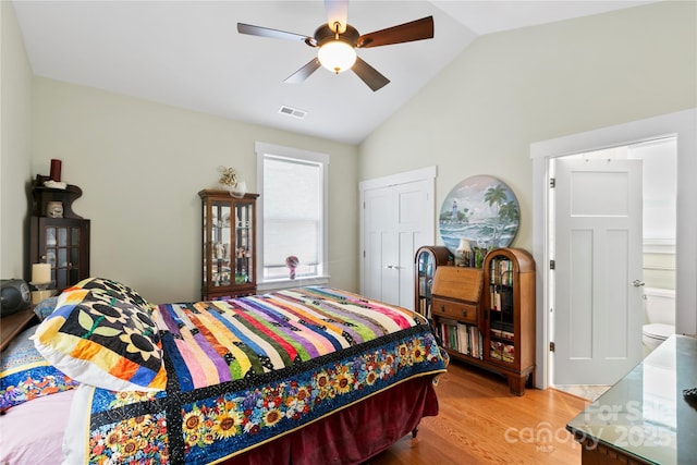 20 Brookstone Pl, Candler, NC 28715 - bedroom with vaulted ceiling, wood finished floors, and a ceiling fan