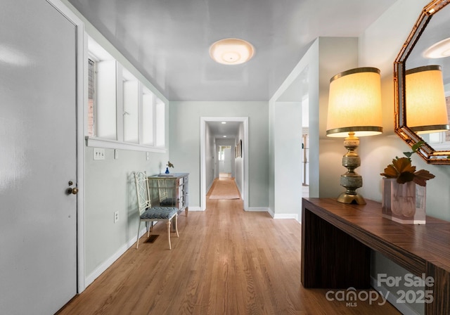 916 E Park Dr, Lincolnton, NC 28092 - corridor with light wood-type flooring and baseboards