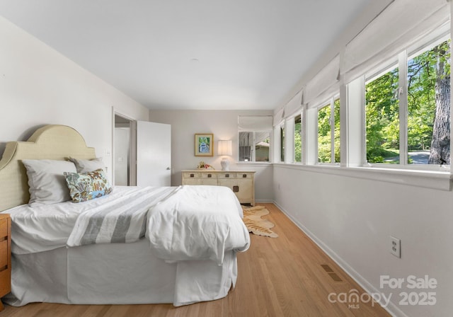 916 E Park Dr, Lincolnton, NC 28092 - bedroom featuring baseboards and light wood-type flooring