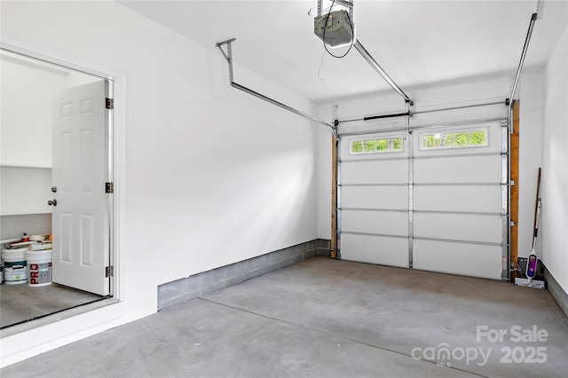 garage featuring a garage door opener