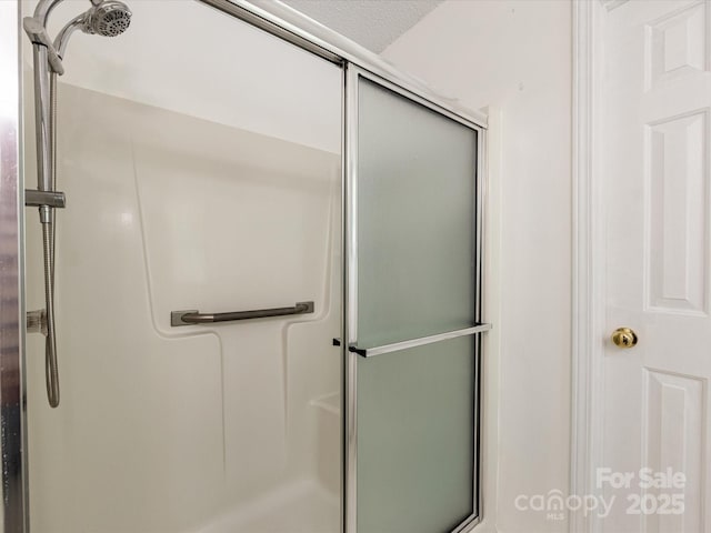 full bath featuring a stall shower