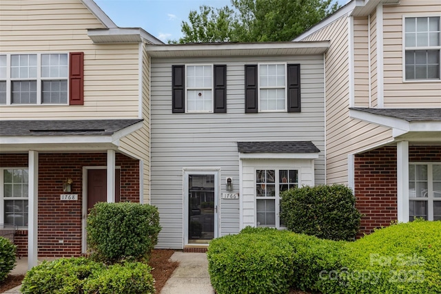 1766 Forest Side Ln, Charlotte, NC 28213 - exterior space featuring brick siding and a shingled roof