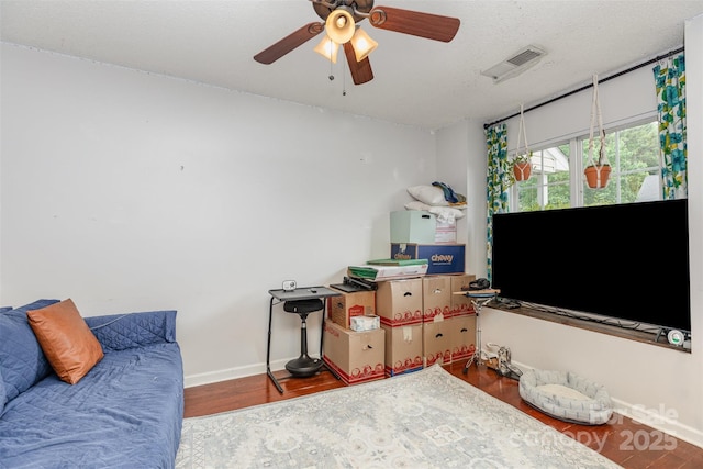 1766 Forest Side Ln, Charlotte, NC 28213 - interior space with a ceiling fan, baseboards, visible vents, and wood finished floors