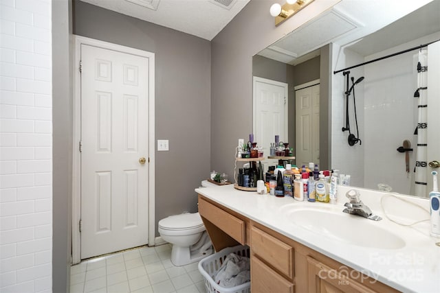 1766 Forest Side Ln, Charlotte, NC 28213 - full bathroom with visible vents, vanity, tile patterned floors, toilet, and a shower with shower curtain