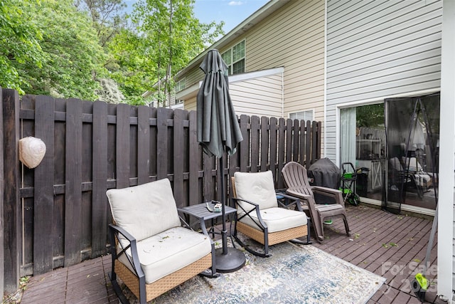 1766 Forest Side Ln, Charlotte, NC 28213 - view of patio with fence and a deck