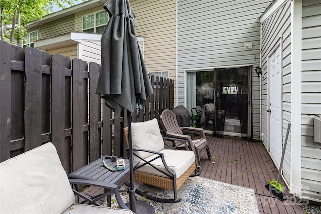 1766 Forest Side Ln, Charlotte, NC 28213 - view of patio featuring fence and a deck