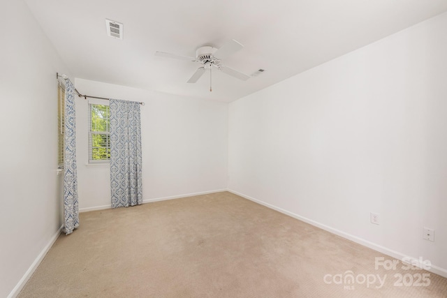 9012 Saint Thomas Ln, Charlotte, NC 28277 - unfurnished room with visible vents, ceiling fan, baseboards, and carpet floors