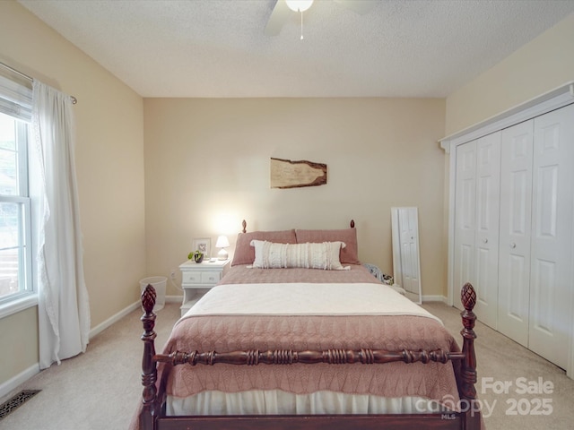 215 6th St, Belmont, NC 28012 - bedroom with carpet flooring, multiple windows, and a closet