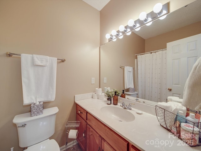 215 6th St, Belmont, NC 28012 - bathroom featuring vanity, toilet, and curtained shower