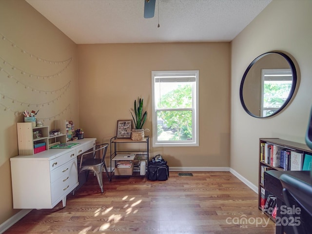 215 6th St, Belmont, NC 28012 - office featuring light wood-type flooring, a ceiling fan, baseboards, and a textured ceiling