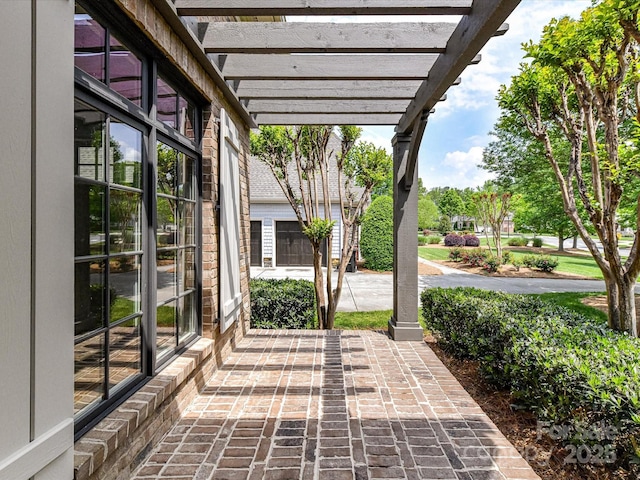 view of patio featuring a pergola