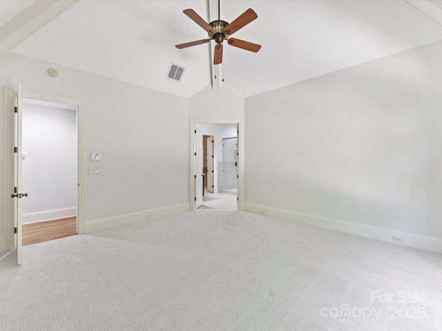 unfurnished room featuring visible vents, a ceiling fan, light carpet, baseboards, and high vaulted ceiling