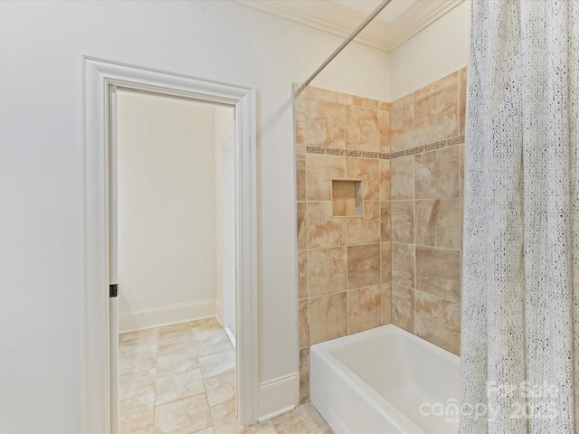 full bath featuring baseboards, shower / bathtub combination with curtain, and ornamental molding