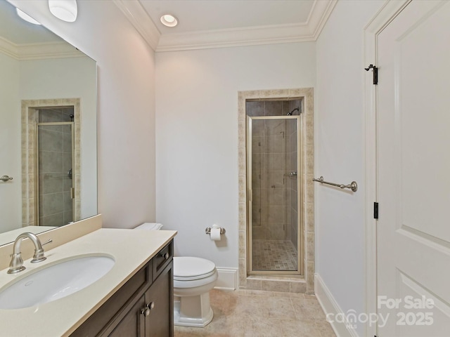 bathroom with toilet, baseboards, and a stall shower