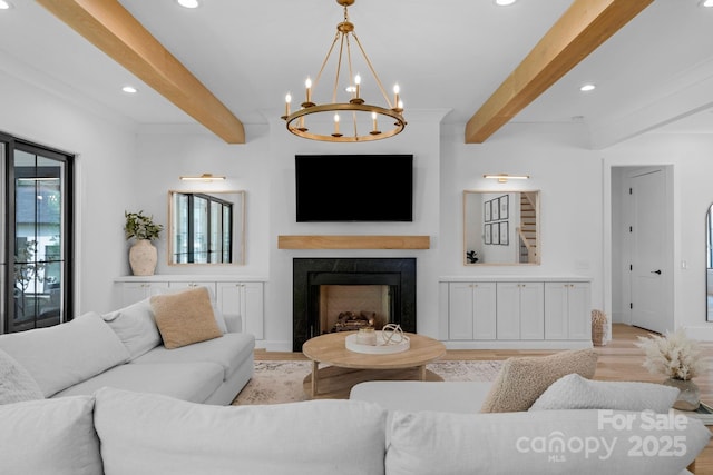 2165 Country Club Rd, Lincolnton, NC 28092 - living room featuring beamed ceiling, light wood-style floors, recessed lighting, and an inviting chandelier
