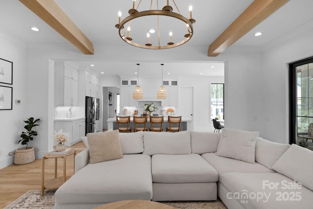 2165 Country Club Rd, Lincolnton, NC 28092 - living area featuring an inviting chandelier, wood finished floors, beamed ceiling, and recessed lighting