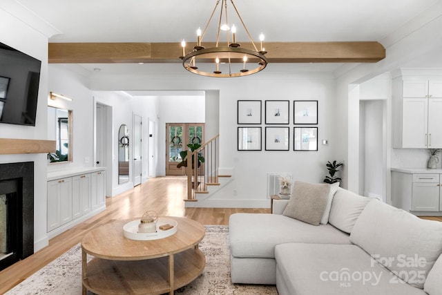 2165 Country Club Rd, Lincolnton, NC 28092 - living area featuring beamed ceiling, plenty of natural light, and light wood-style flooring
