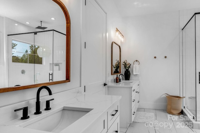 2165 Country Club Rd, Lincolnton, NC 28092 - full bathroom with two vanities, a sink, recessed lighting, and a stall shower