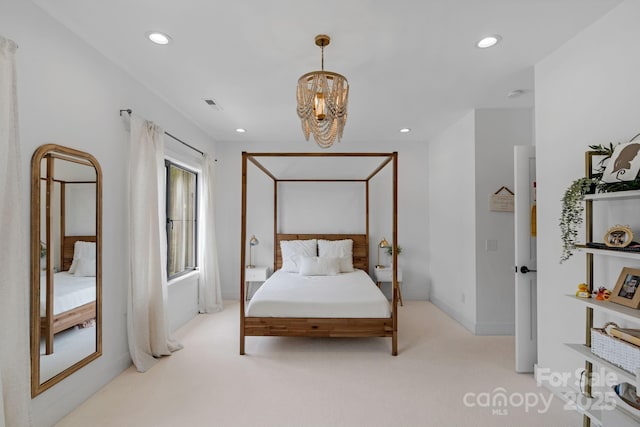 2165 Country Club Rd, Lincolnton, NC 28092 - bedroom featuring light colored carpet, a notable chandelier, visible vents, and recessed lighting