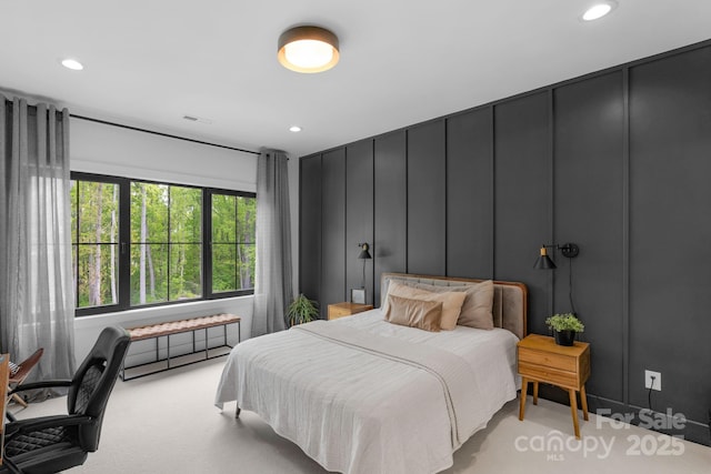 2165 Country Club Rd, Lincolnton, NC 28092 - bedroom featuring a decorative wall, visible vents, carpet floors, and recessed lighting