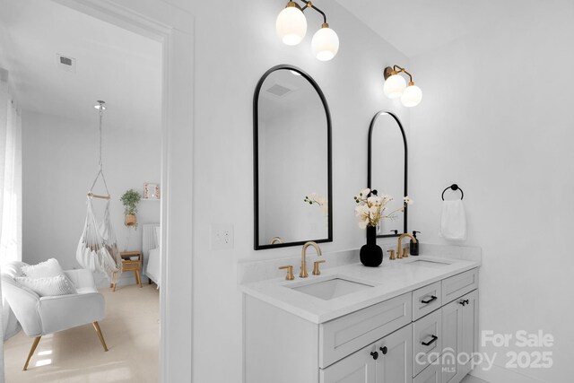 2165 Country Club Rd, Lincolnton, NC 28092 - bathroom with a sink, visible vents, and double vanity